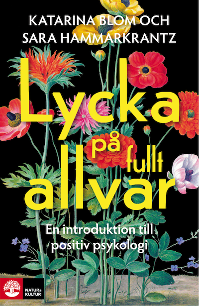 Framsidan av boken Lycka på fullt allvar, med gul titeltext över färglada blommor på mörk bakgrund